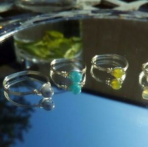 Angelite peridot and sodalite rings set